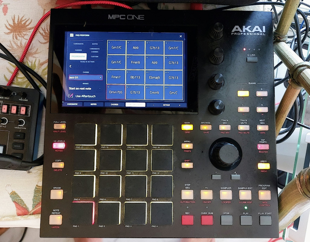 An Akai MPC One standing on a chair